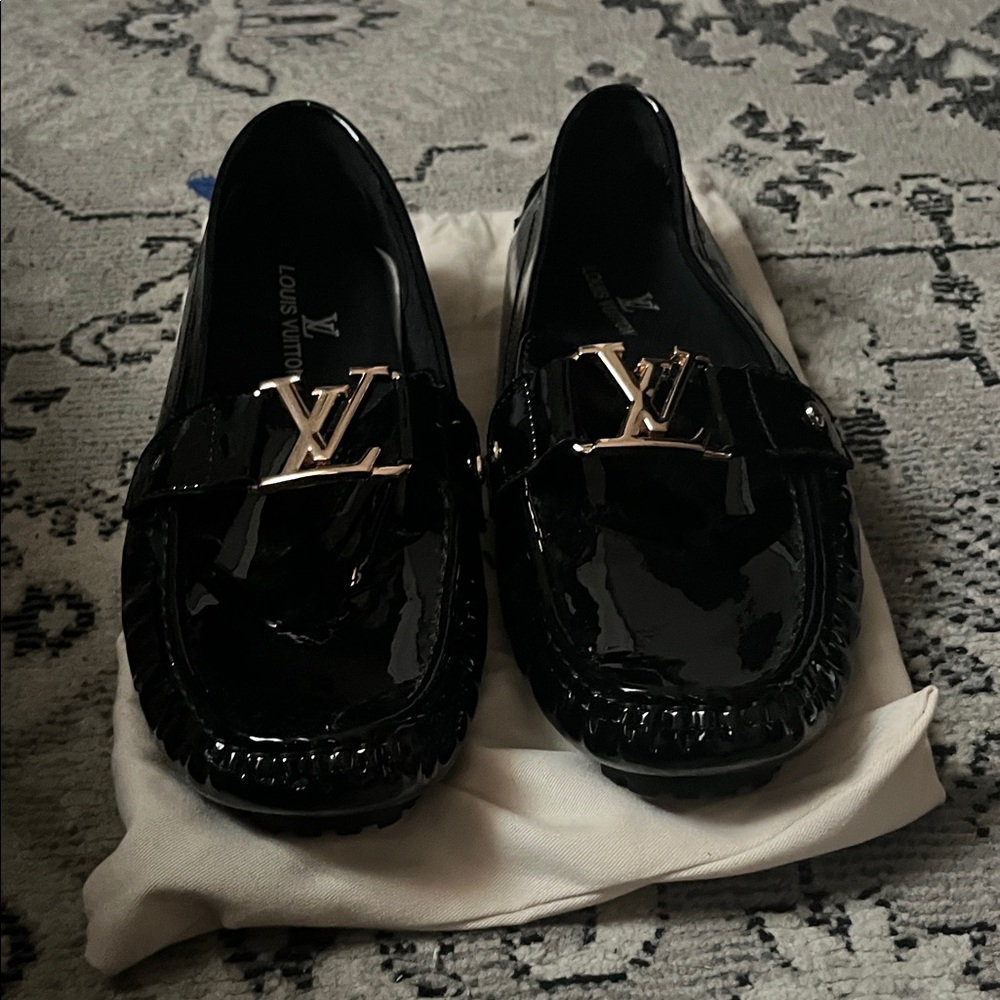 Louis Vuitton Shiny Black Loafers with Gold Logo